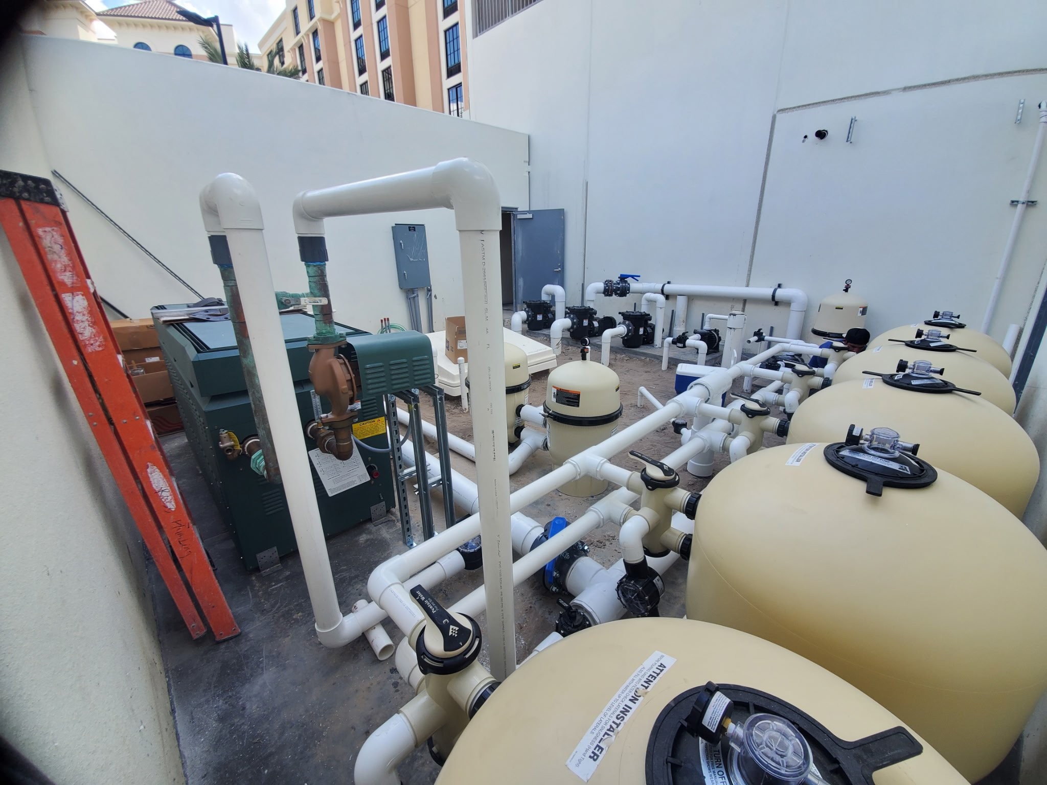 Large commercial filter tank room with six-tank manifold system