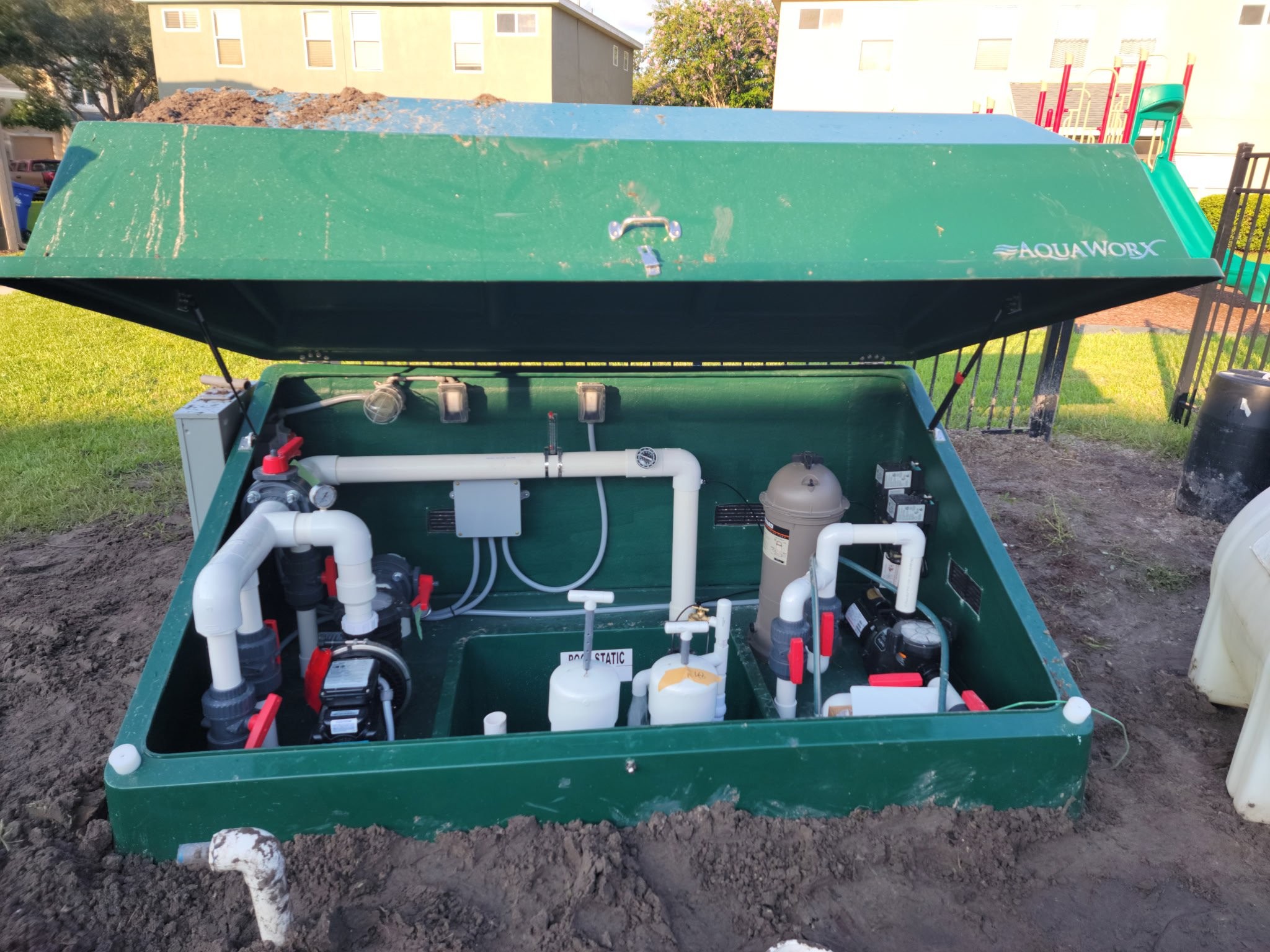 AquaWorx pool equipment pack opened showing pumps, filters and plumbing components