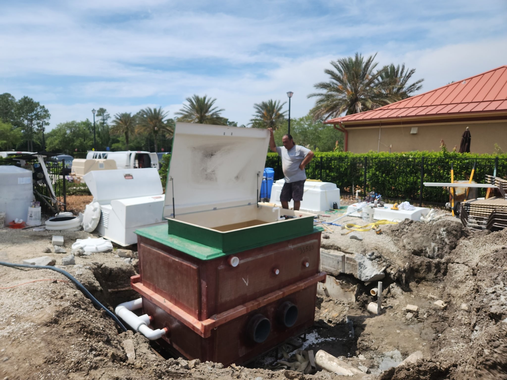 Crane installation of Vak Pak commercial equipment pack at a large HOA waterpark in Jacksonville, FL — Arinton crew on site